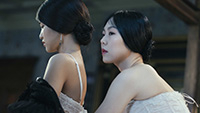 image of two women in side profile